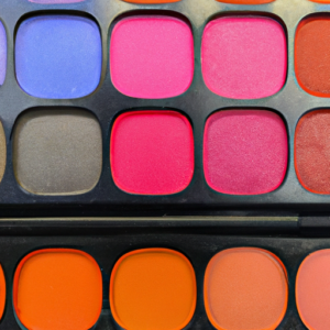 A close-up of a colorful makeup pallet with multiple eyeshadow and blush shades.